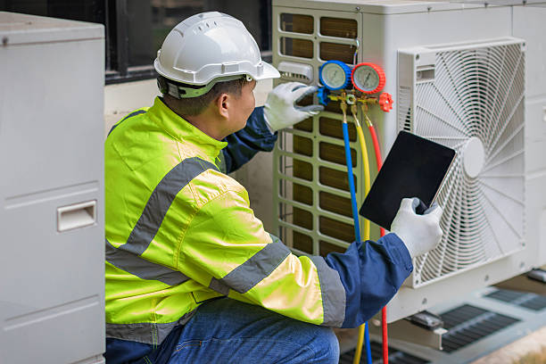 Professional Heat Pump Repair technician working in Astor, FL